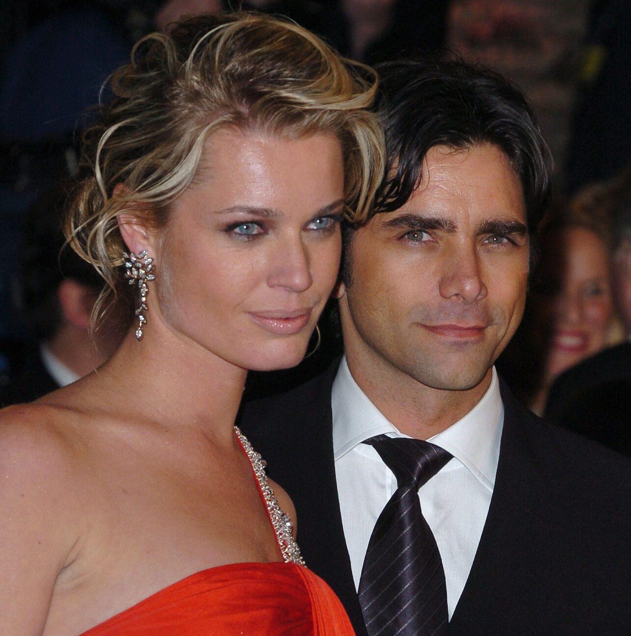 Rebecca Romijn and John Stamos attend Vanity Fair's party after the 76th Academy Awards on Sunday,