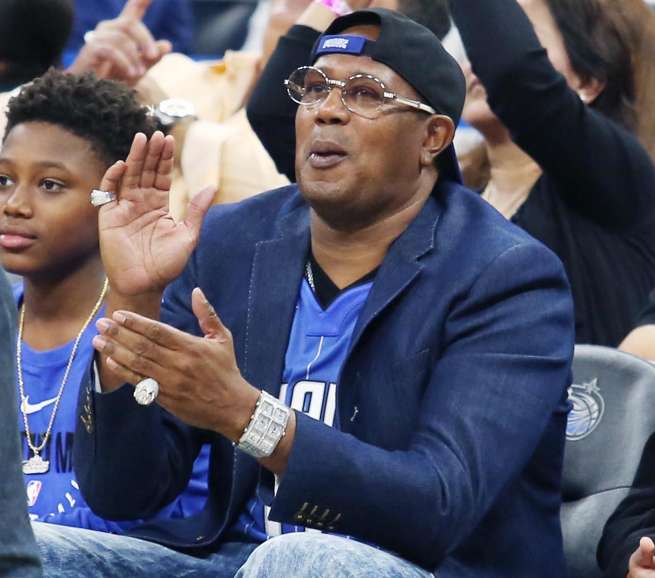 Master P cheers from courtside seats as the Chicago Bulls visit the Orlando Magic in 2017