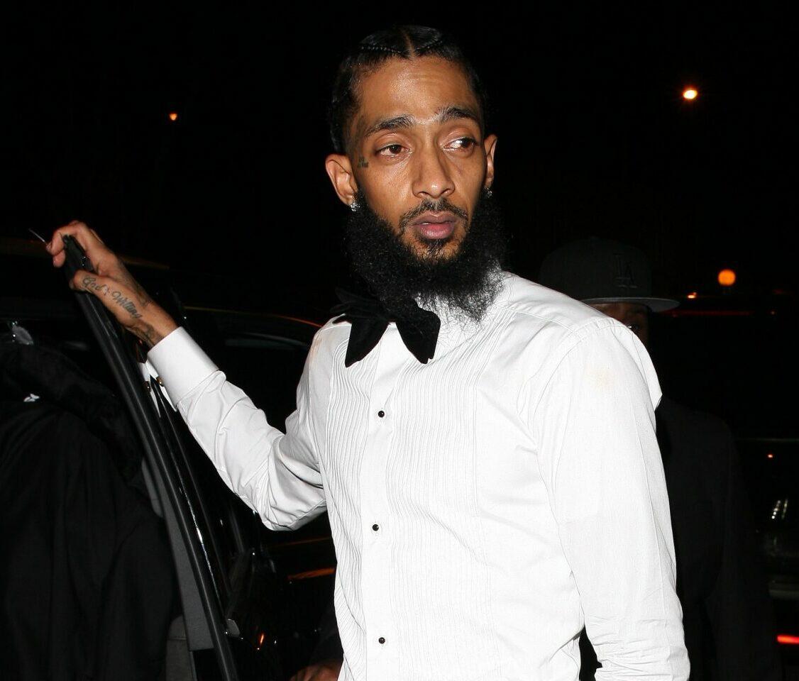 Nipsey Hussle is spotted leaving a Grammy party with actress Lauren London held at the Delilah club