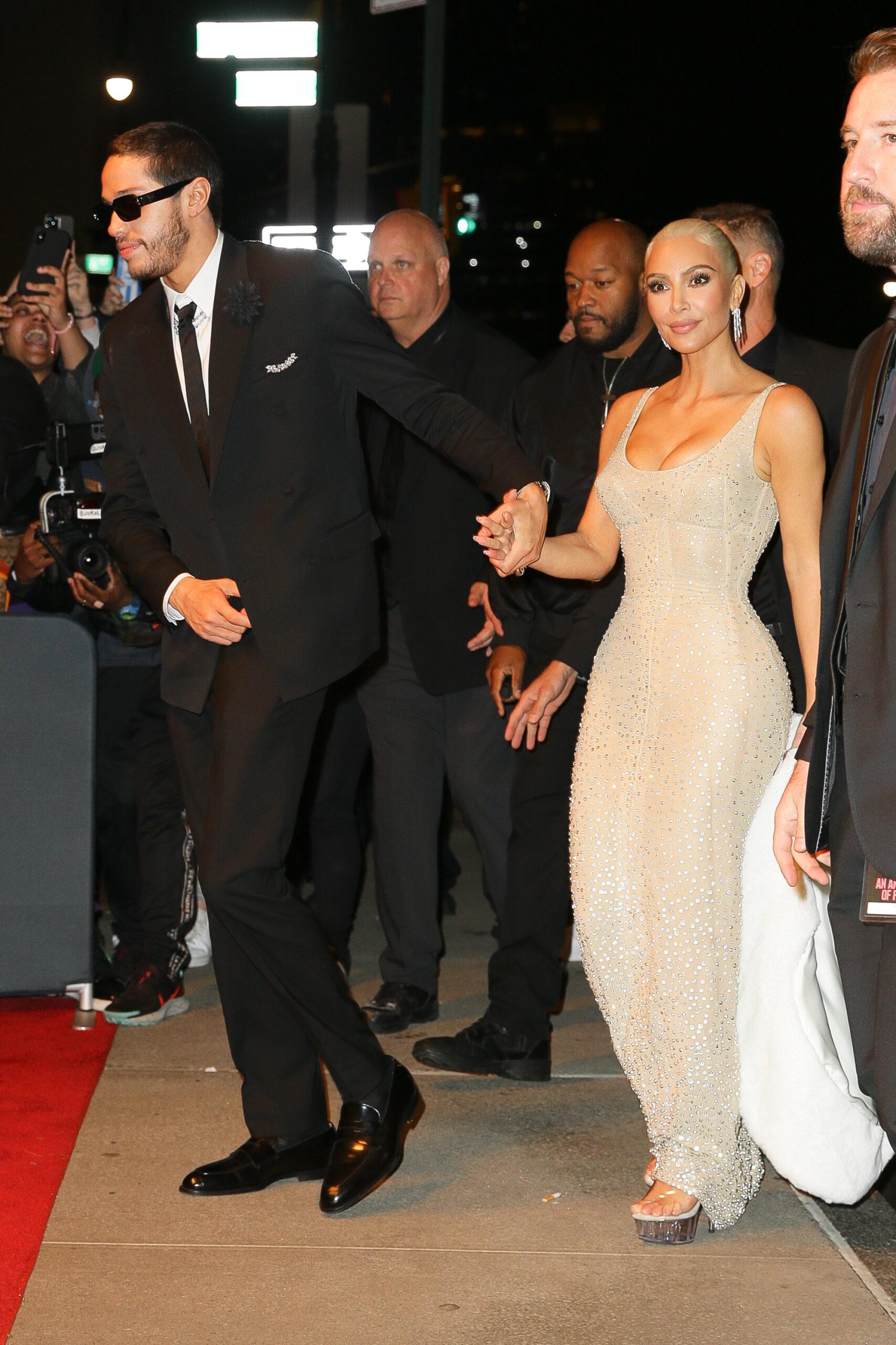 Kim Kardashian and Pete Davidson hold hands while arriving back at their Ritz-Carlton Hotel after attending The MET Gala in New York City