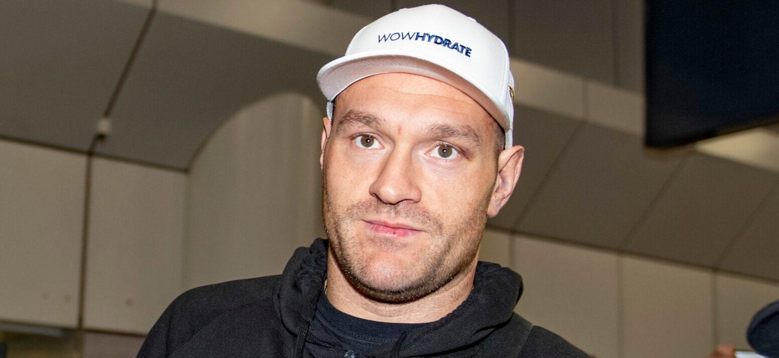 Boxer Tyson Fury arrives back at Manchester Airport on February 25th 2020 after defeating Deontay Wilder in Las Vegas to claim the WBC heavyweight title.
