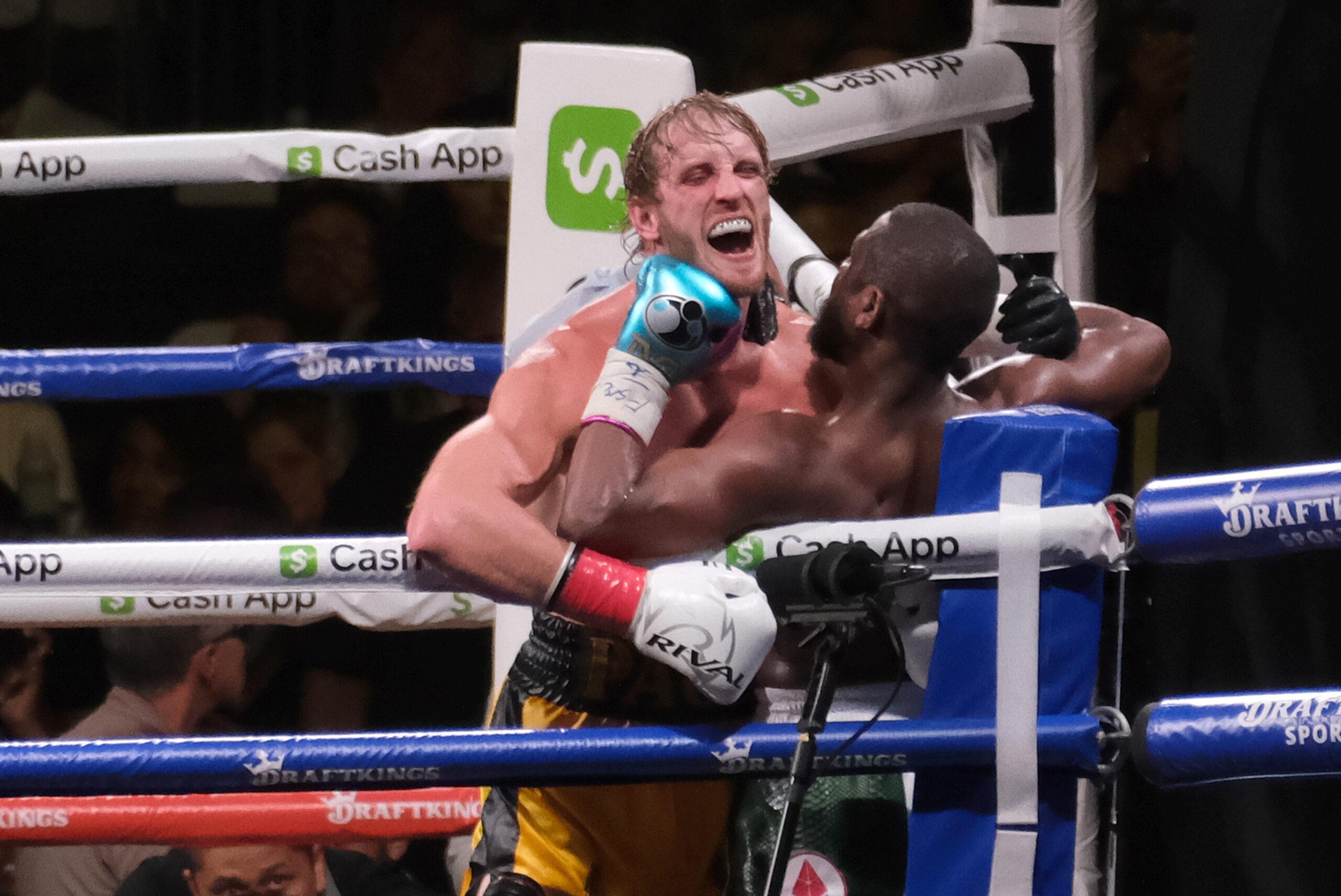 Floyd Mayweather, 44 hits Logan Paul, 26 in his chin during an exhibition fight with at the Hard Rock Stadium on Sunday, June 6, 2021 in Miami Gardens, Florida. 