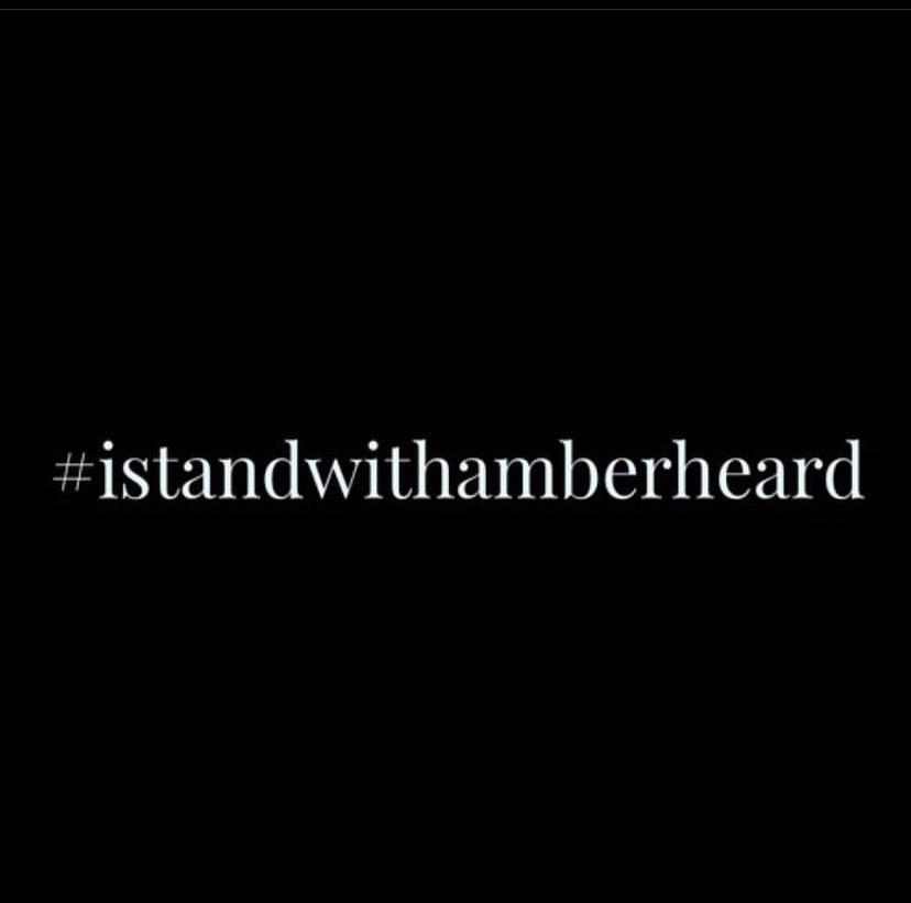 Amber Heard's sister shows her support