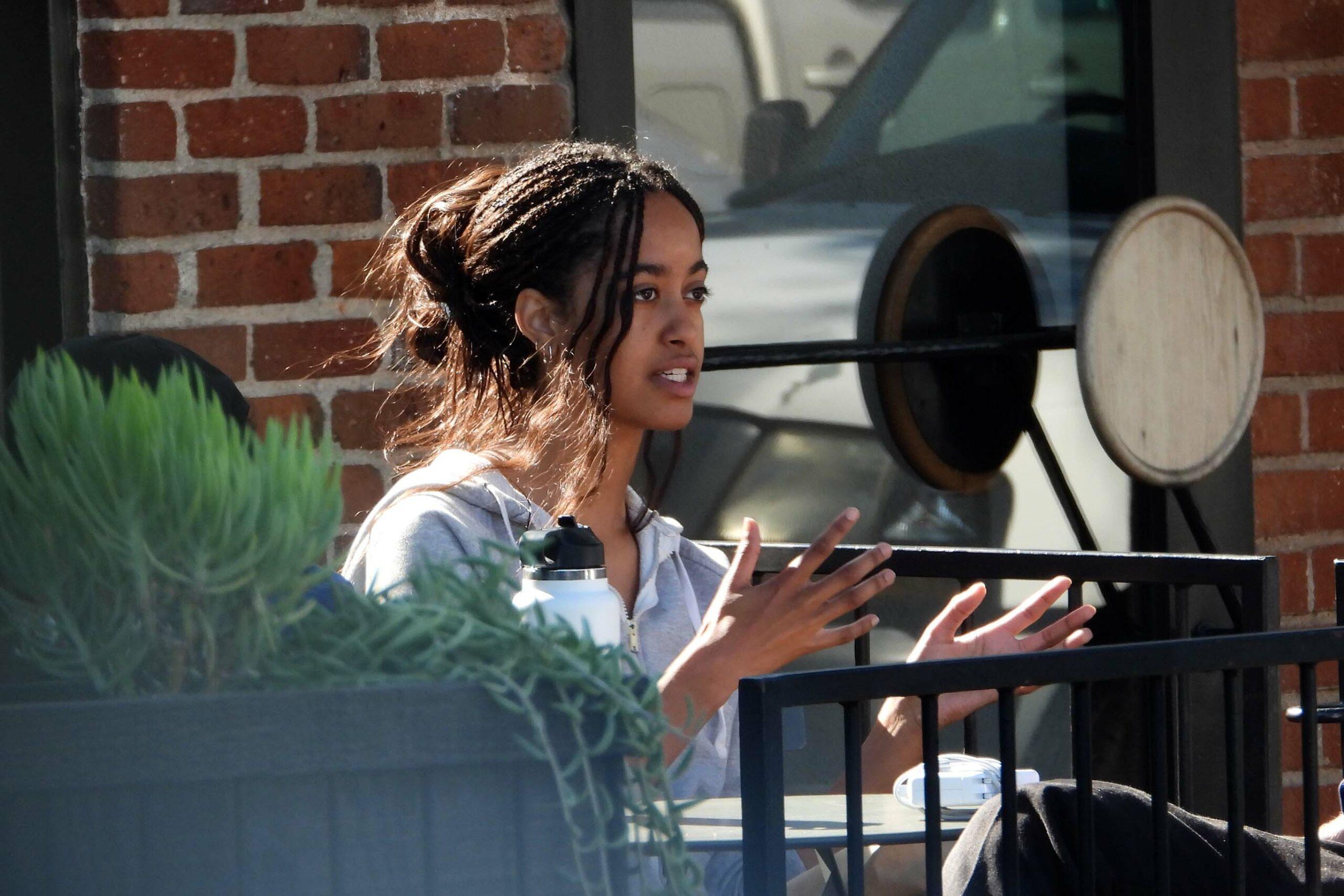 Malia Obama is seen out with a friend grabbing a coffee on Melrose Place