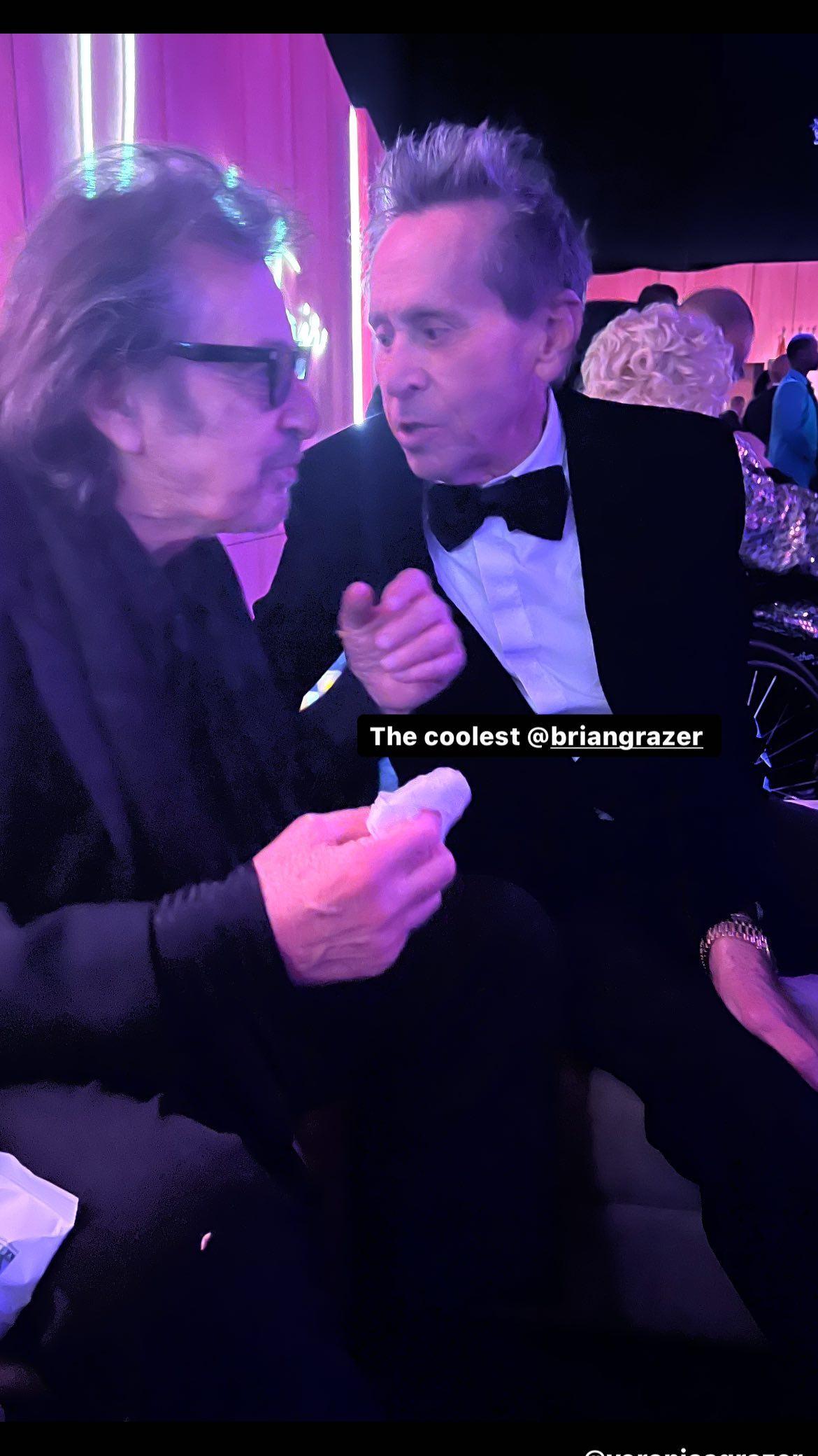 Al Pacino and Brian Grazer talking.