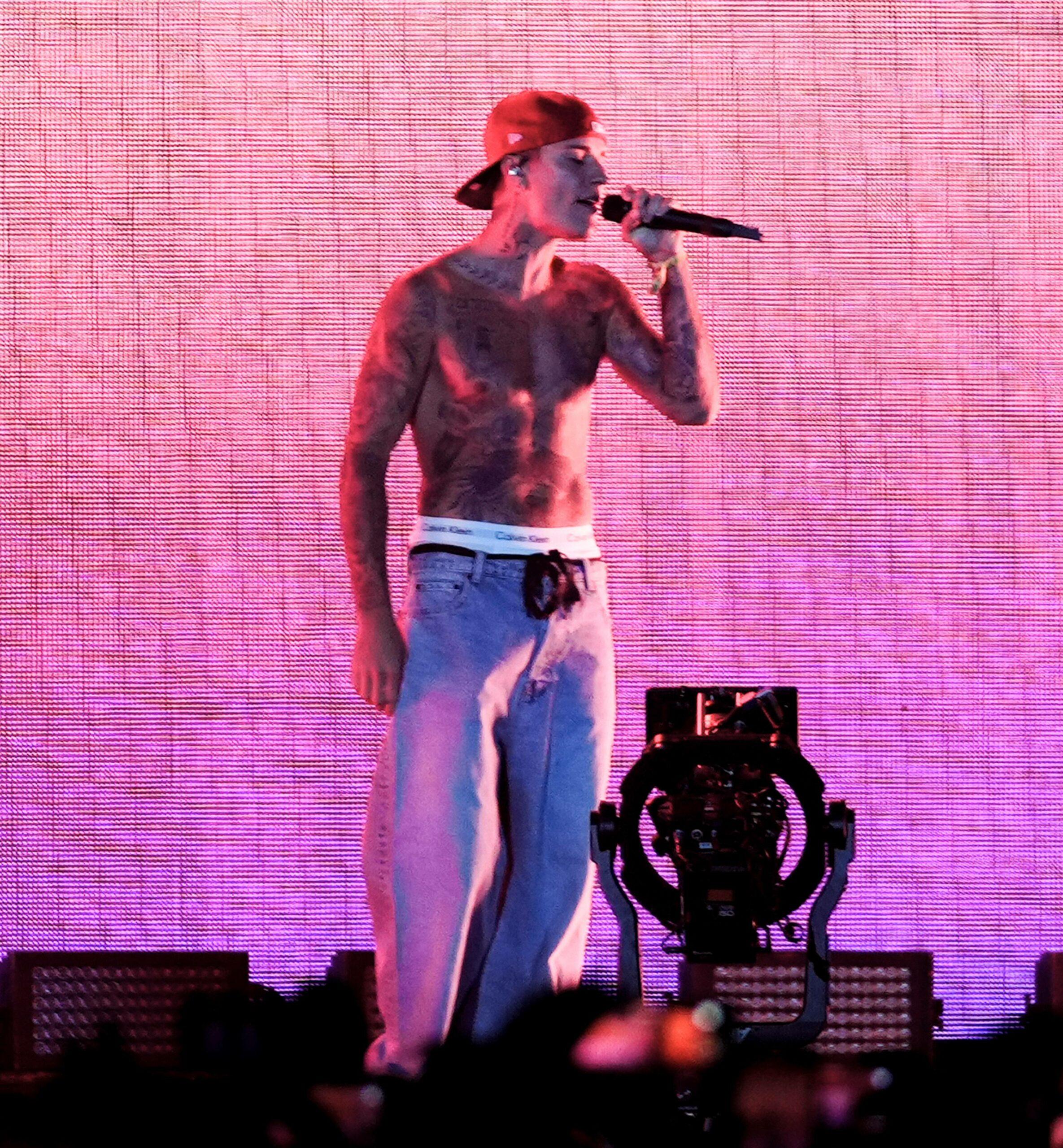 Justin Bieber goes shirtless performing with Justin Ceasar at Coachella Music Festival in Indio, CA