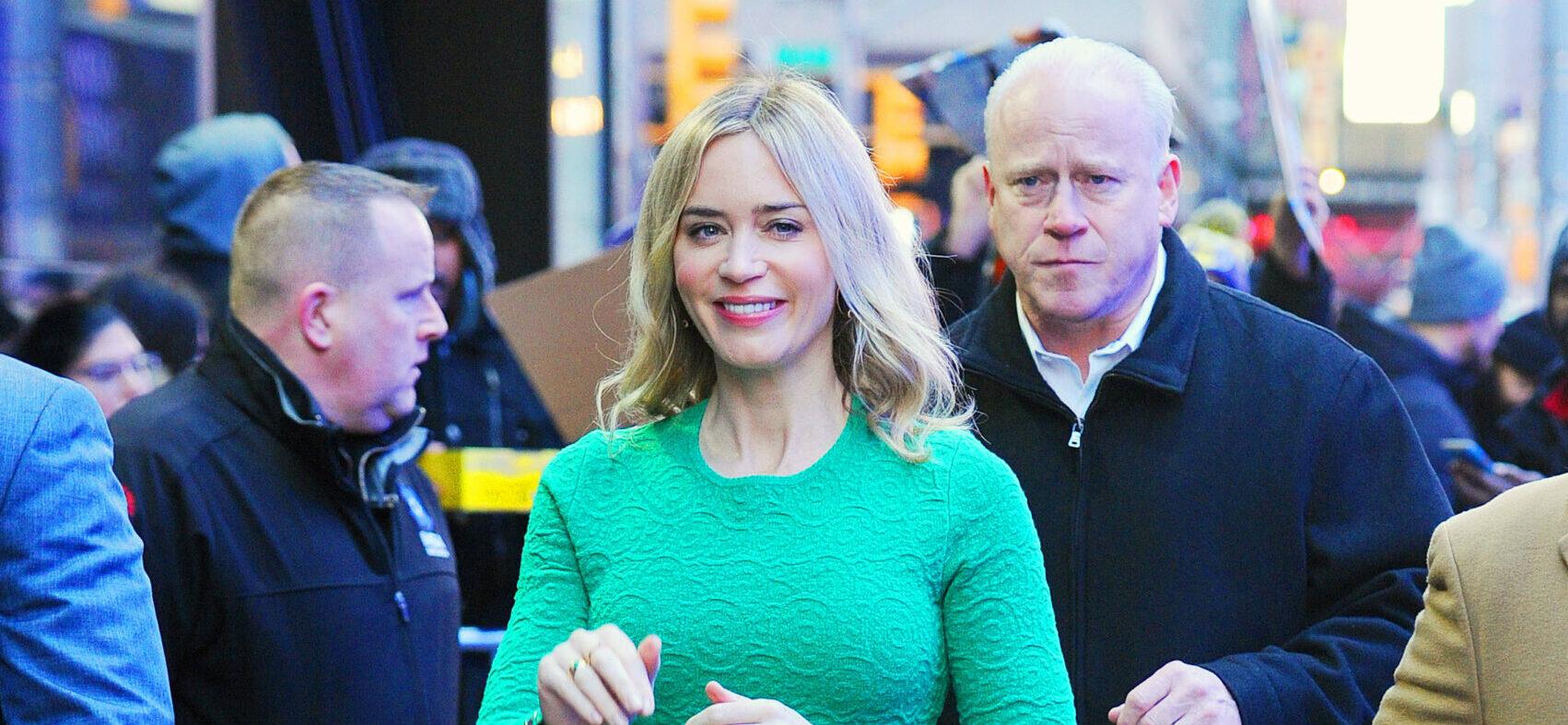Emily Blunt looks stunning in an emerald bodycon dress as she stops by the GMA