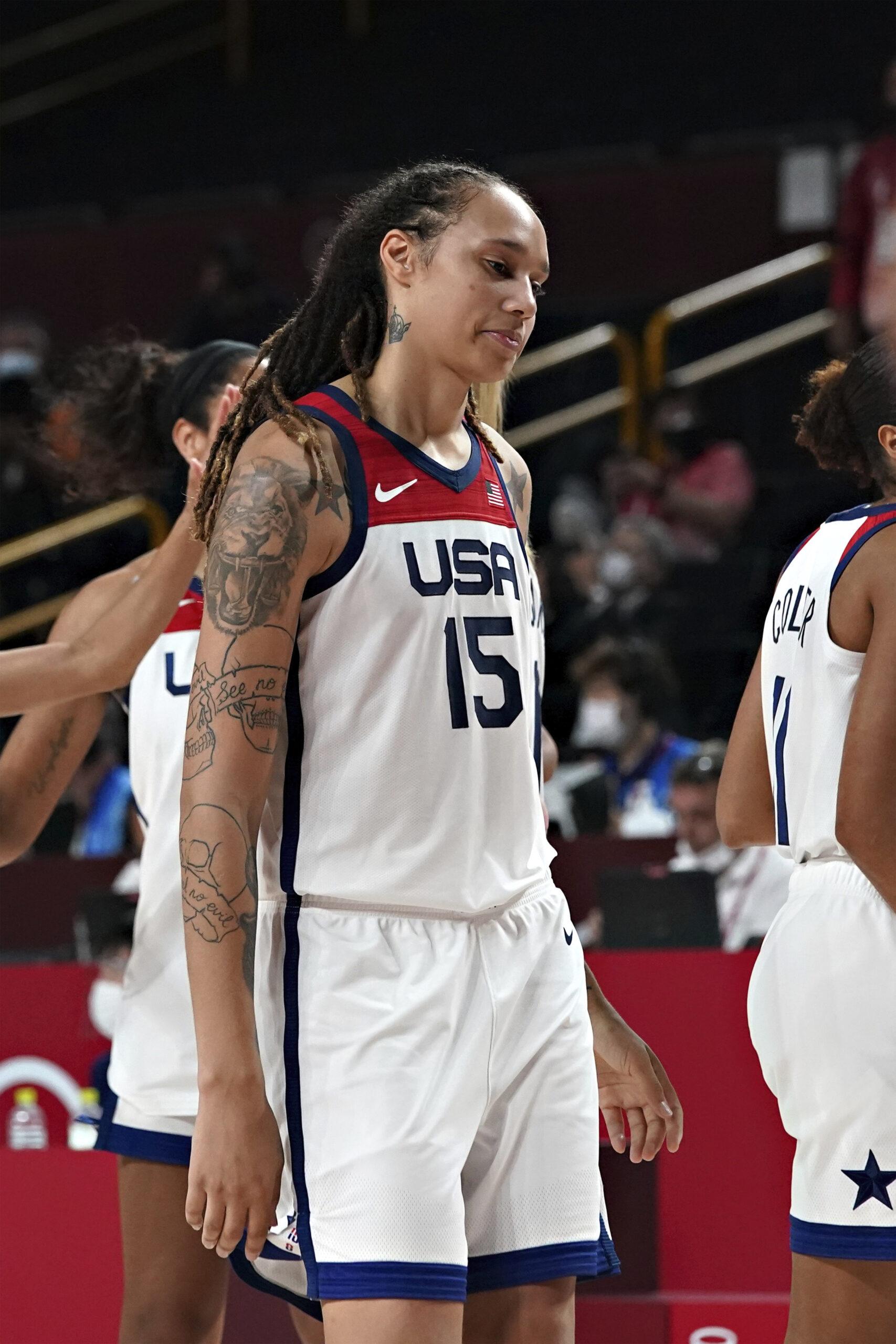 Brittney Griner, #15, walks off the court after the Women's Basketball finals at the Tokyo Olympic Games