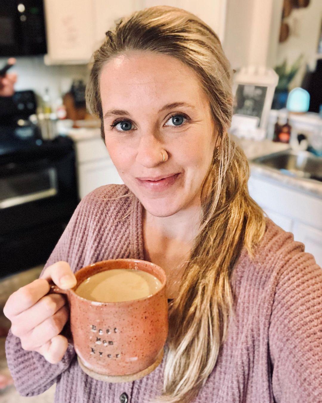 Portrait of Jill Duggar having a coffee posted on her Instagram page