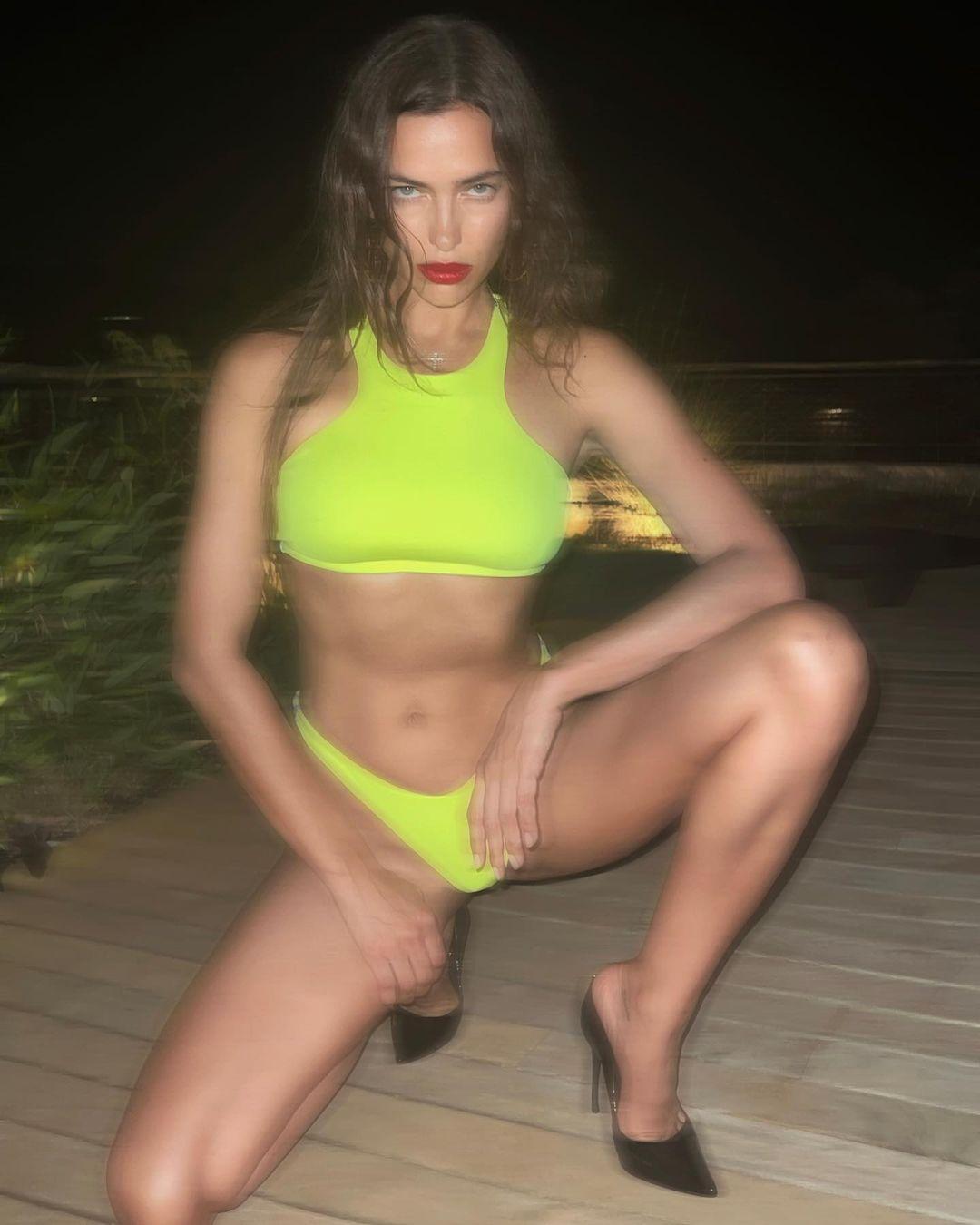 Irina Shayk looks good in a neon yellow bikini