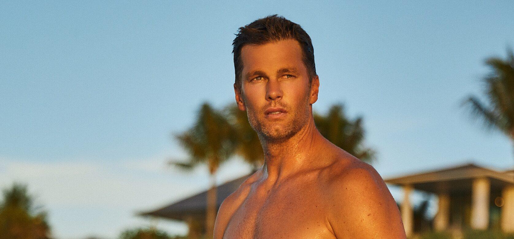 Tom Brady shows off his abs as he poses in new swimwear line