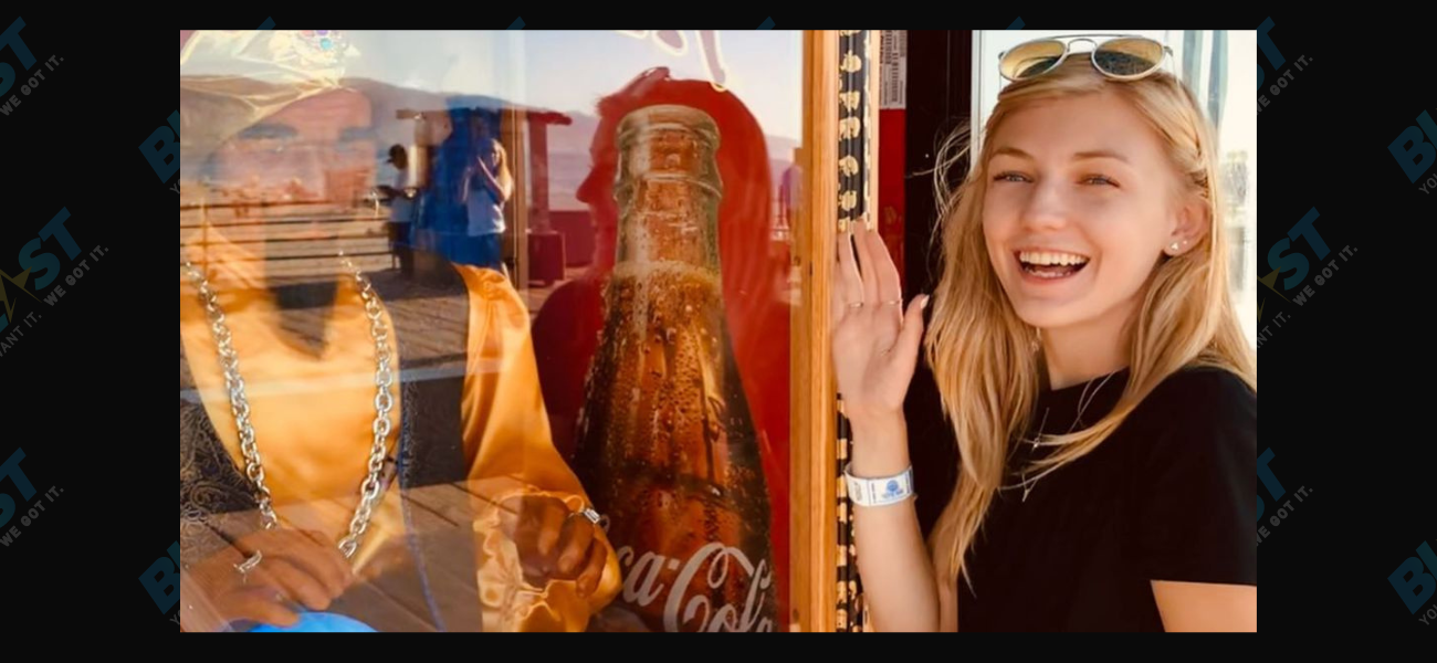 Gabby Petito in front of Zoltar machine