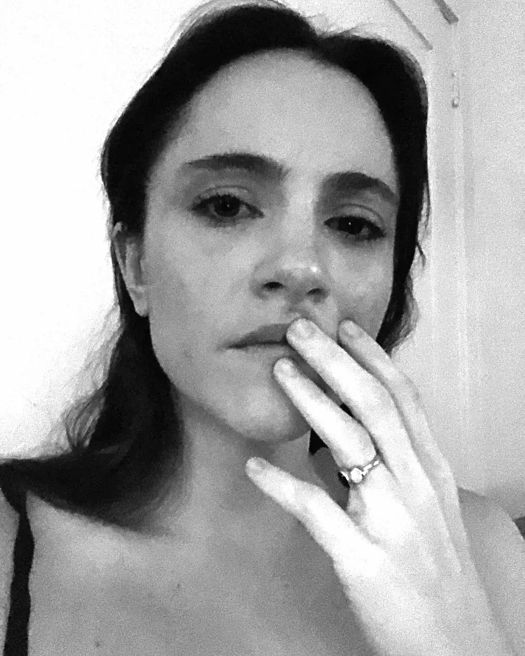 alexa nikolas crying in black and white photo