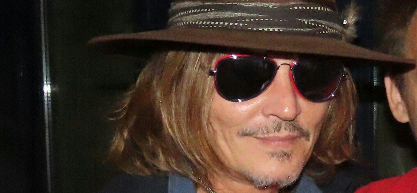 Johnny Depp seen going out of the La Perouse restaurant in Paris