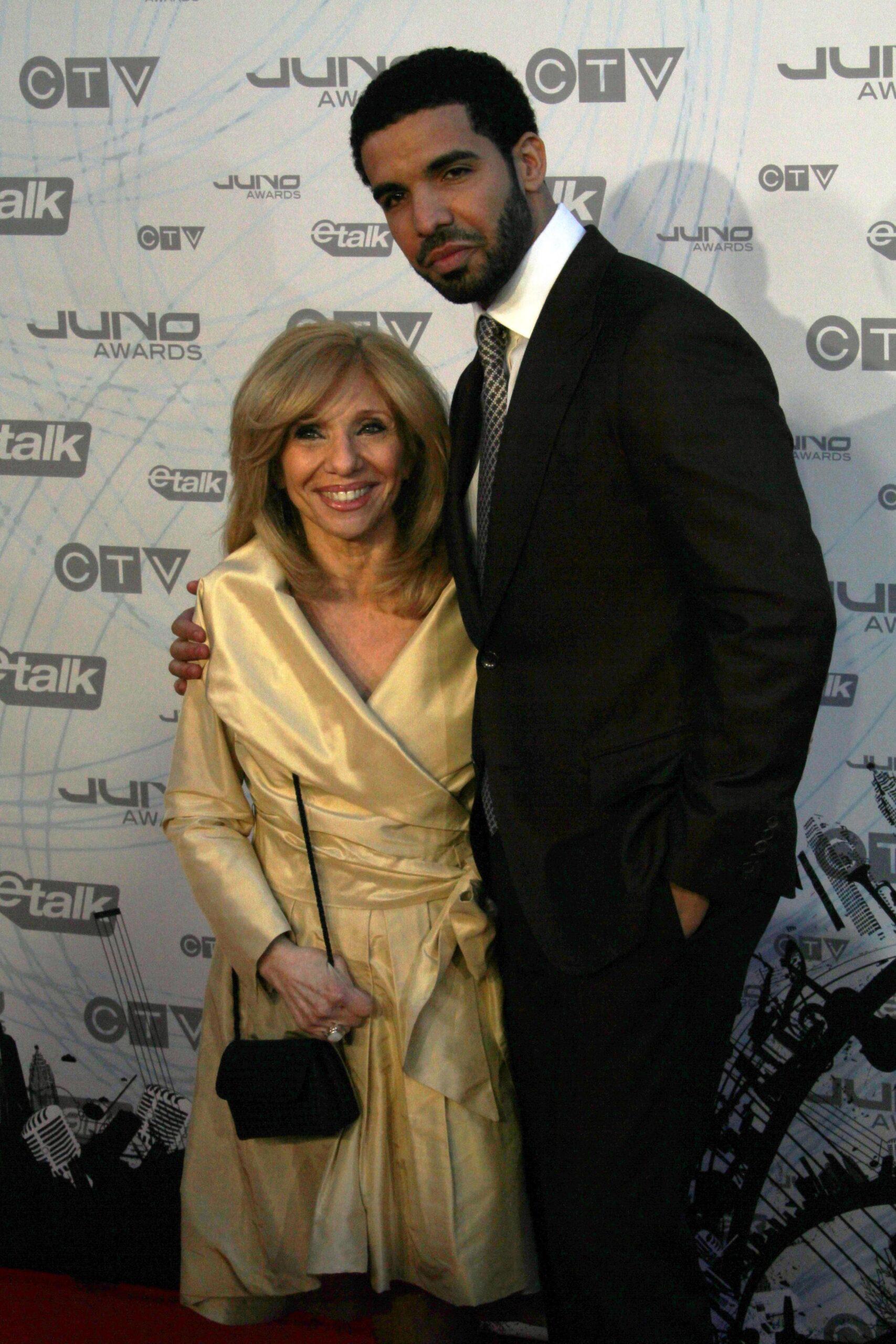 Drake and his Mother arriving on the 2011 Juno Awards Red Carpet at the Air Canada Centre, Toronto, Ontario