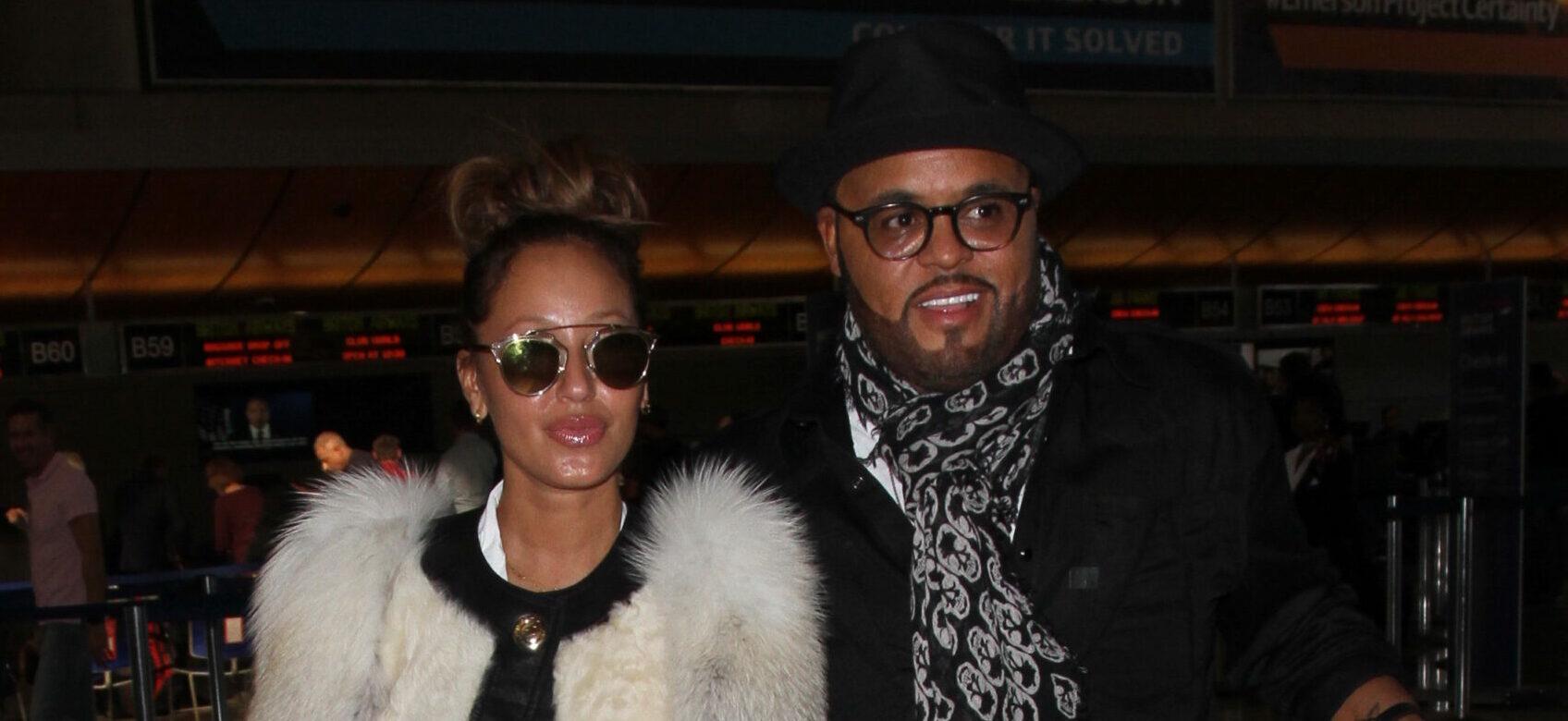 Adrienne Bailon and her husband Israel Houghton depart from Los Angeles International Airport (LAX)