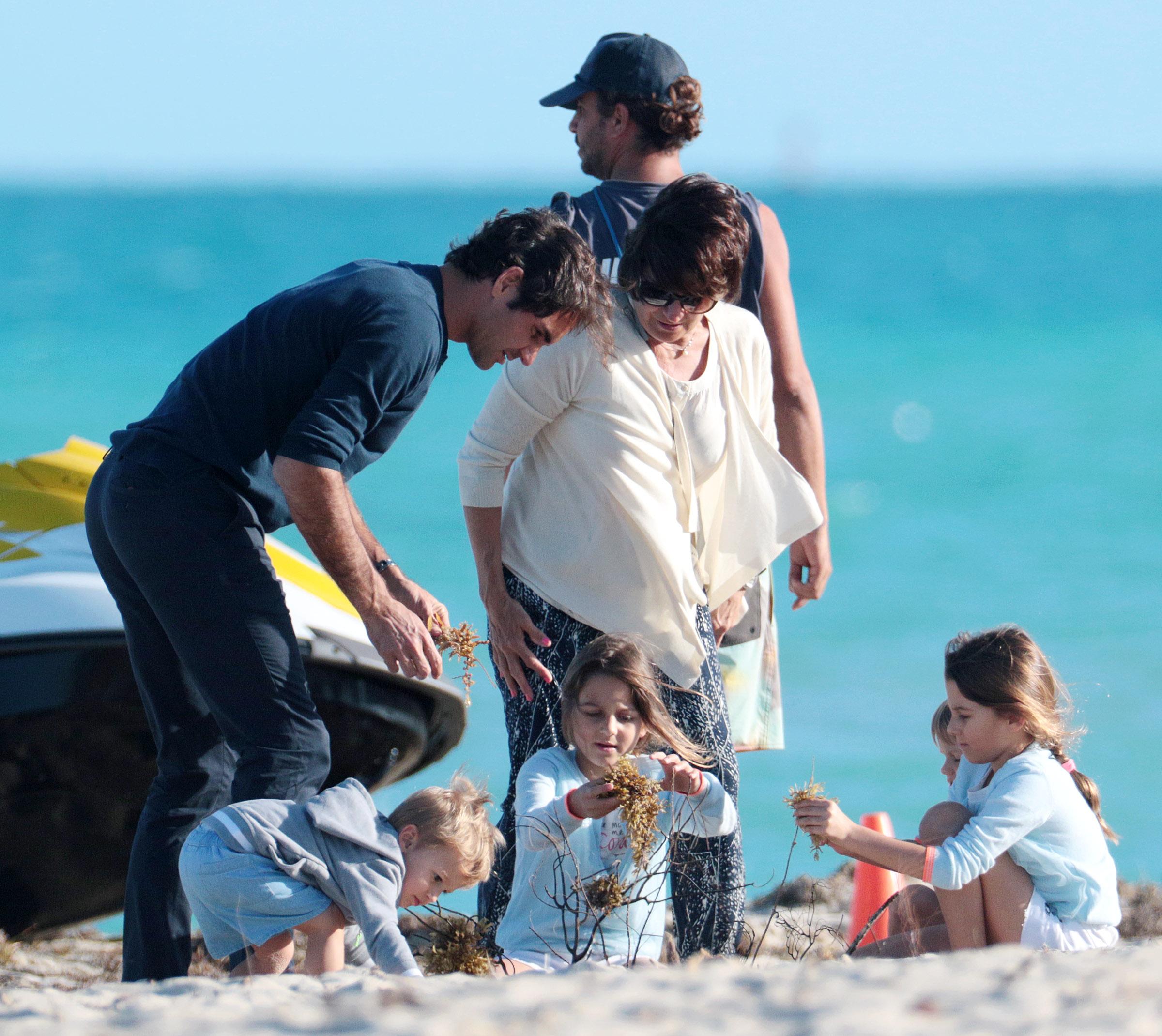 Tennis star Roger Federer with his family at the beach in Miami