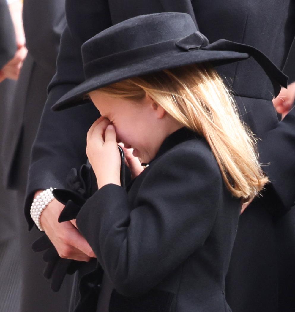 Princess Charlotte seen in tears at the funeral of her great grandmother Queen Elizabeth II