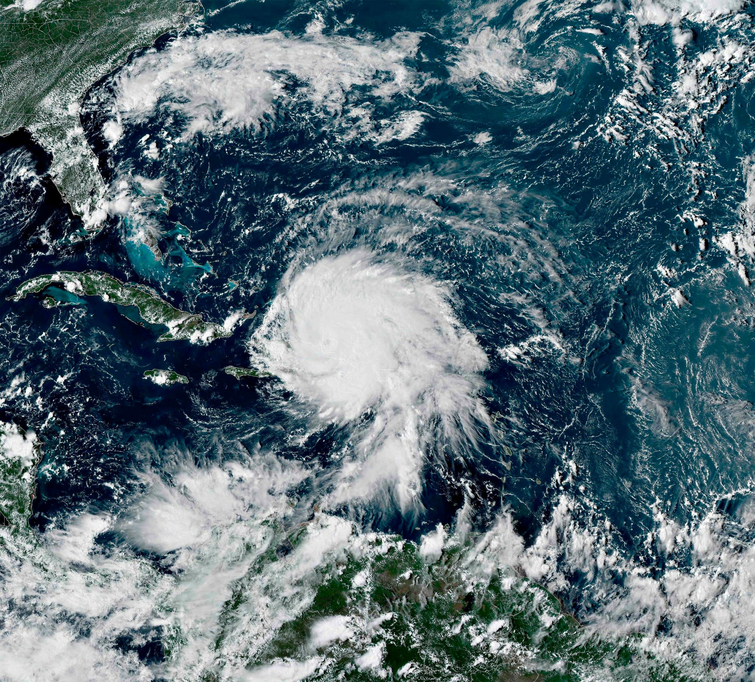Hurricane Fiona as it moves north east across the Dominican Republic a it leaves a storm damaged Puerto Rico.