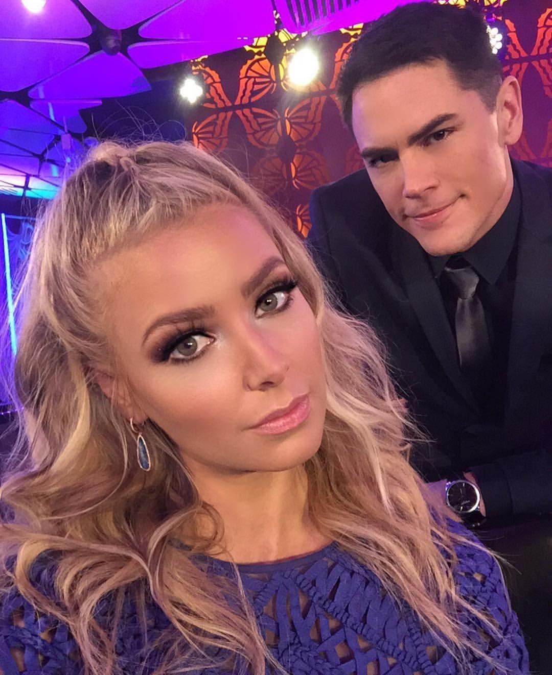 ariana madix and tom sandoval taking a selfie at the reunion