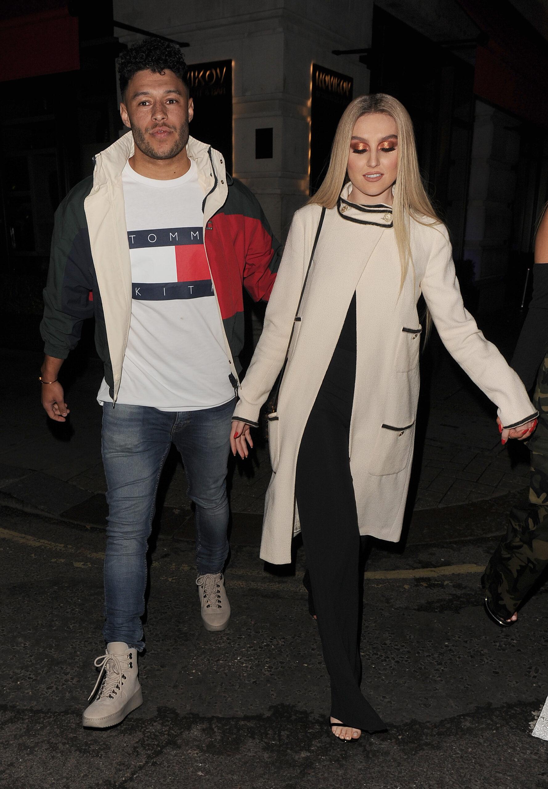 Little Mix band members Jade Thirlwall Leigh-Anne Pinnock Perrie Edwards and Jesy Nelson are seen leaving Novikov restaurant Perrie was with her boyfriend Alex Oxlade-Chamberlain and Leigh-Anne brought her boyfriend Andre Gray