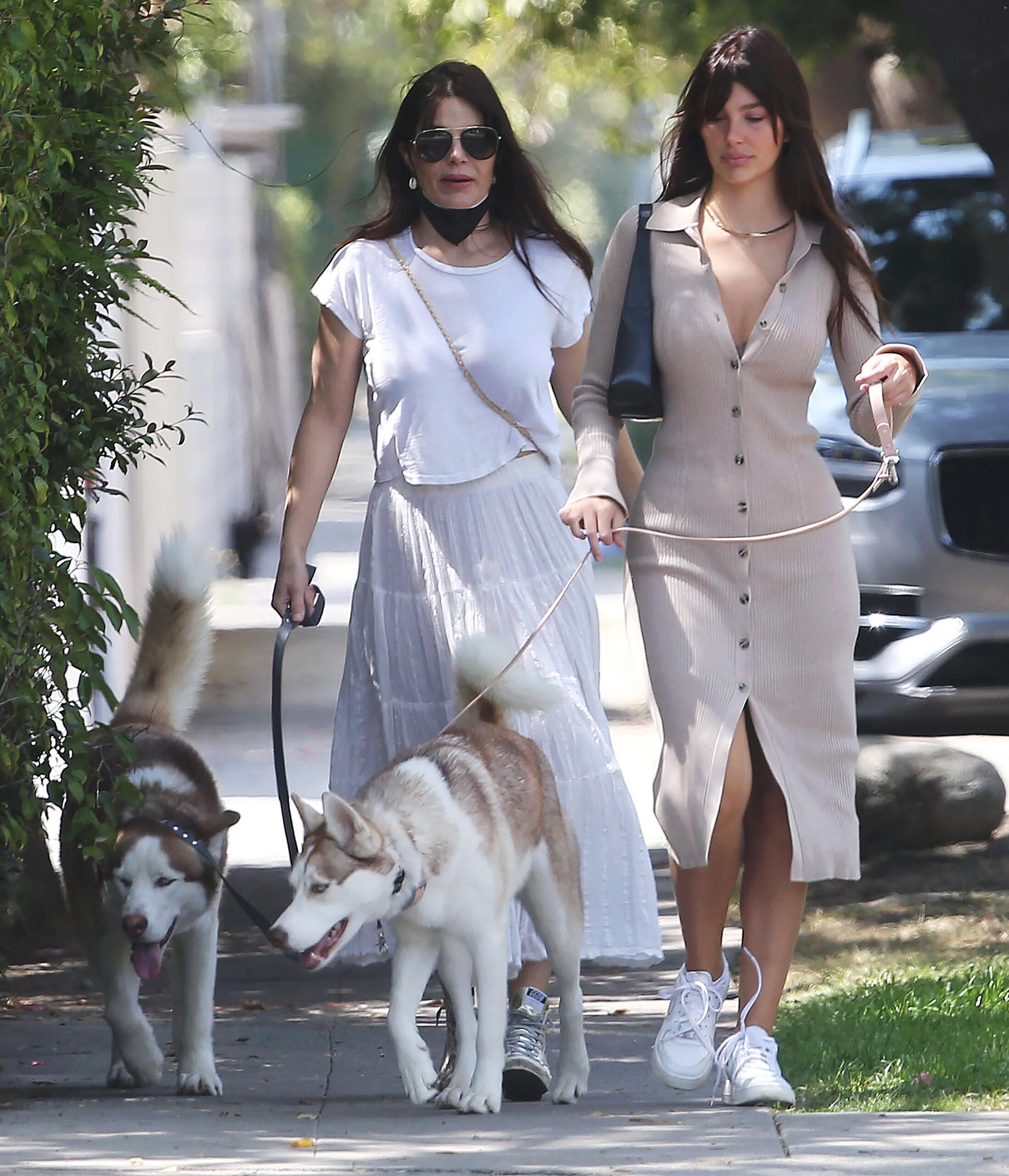 Camila Morrone walking her dogs with her mother in Los Angeles