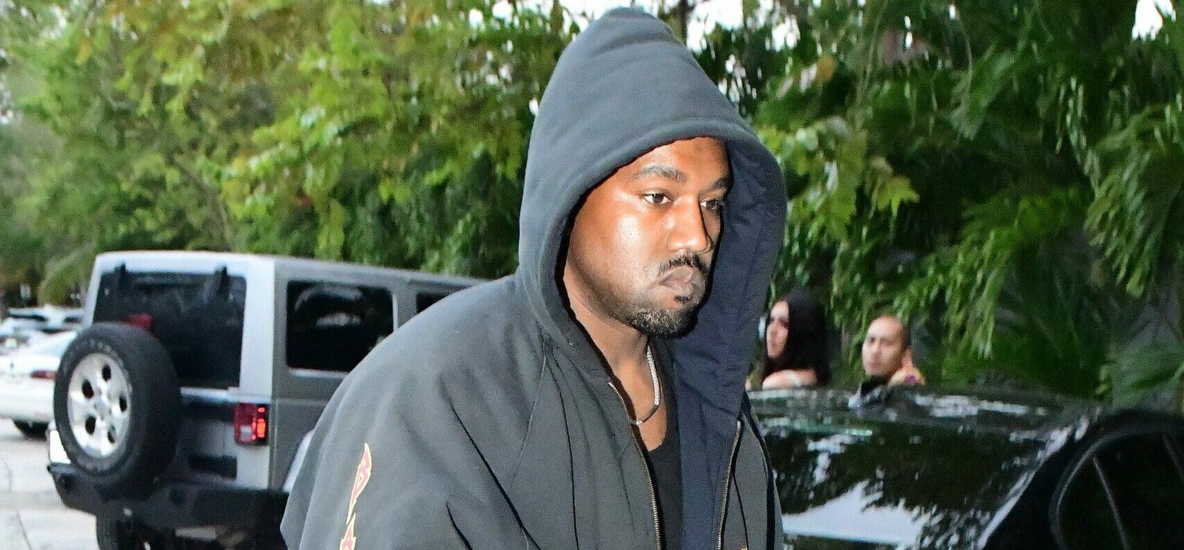 Kanye West is seen for the first time since becoming legally single as he hits up a tattoo shop in Miami