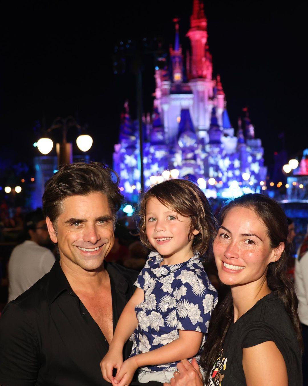 John Stamos and his wife Caitlin McHugh with their son Billy