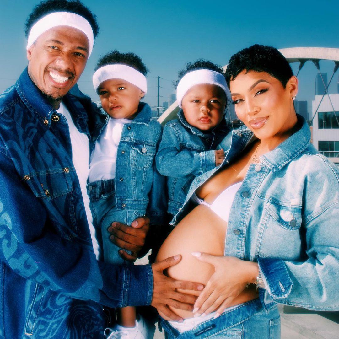 Abby De La Rosa and Nick Cannon with family