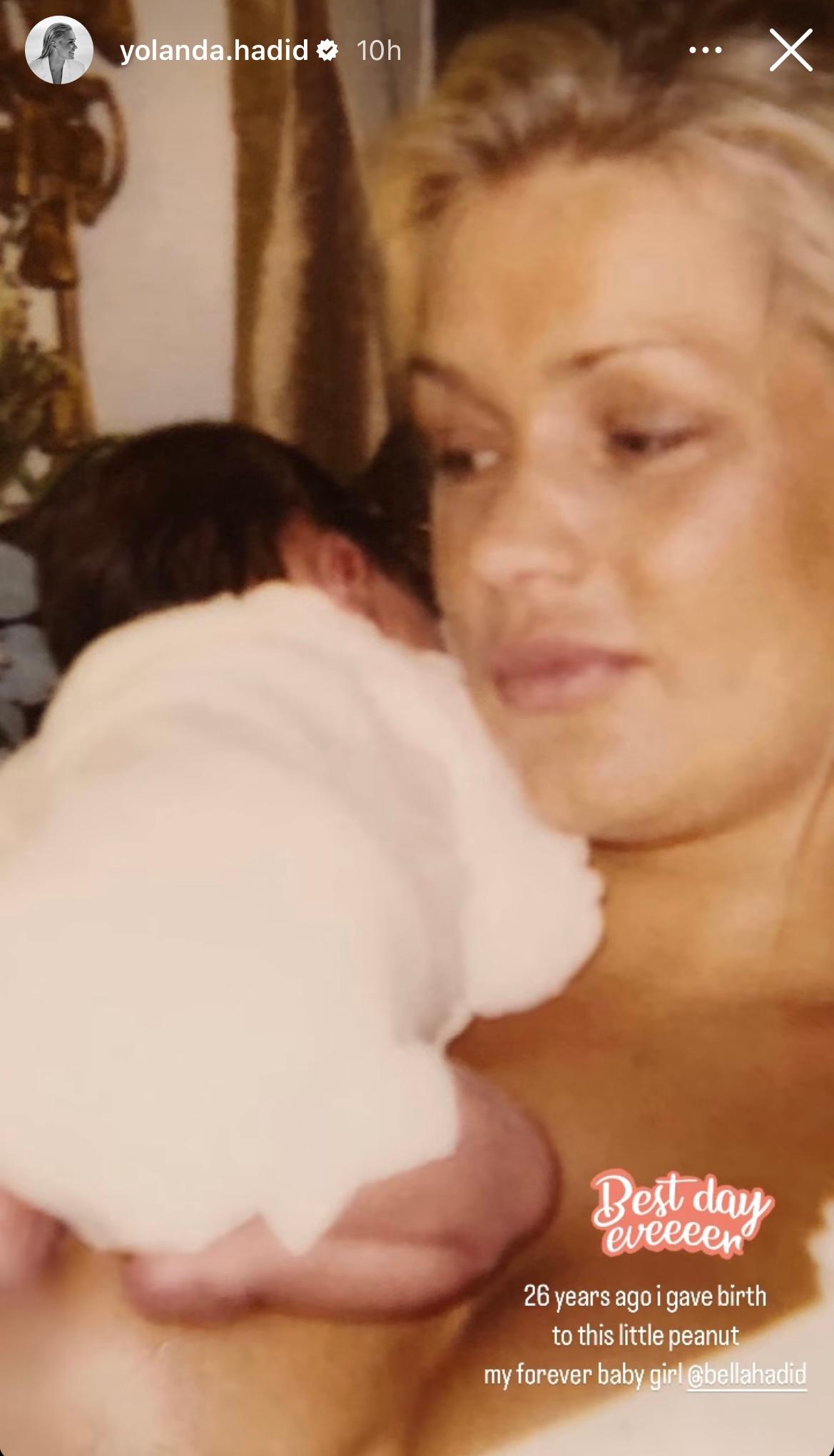 A throwback picture of Yolanda Hadid carrying a baby Bella Hadid