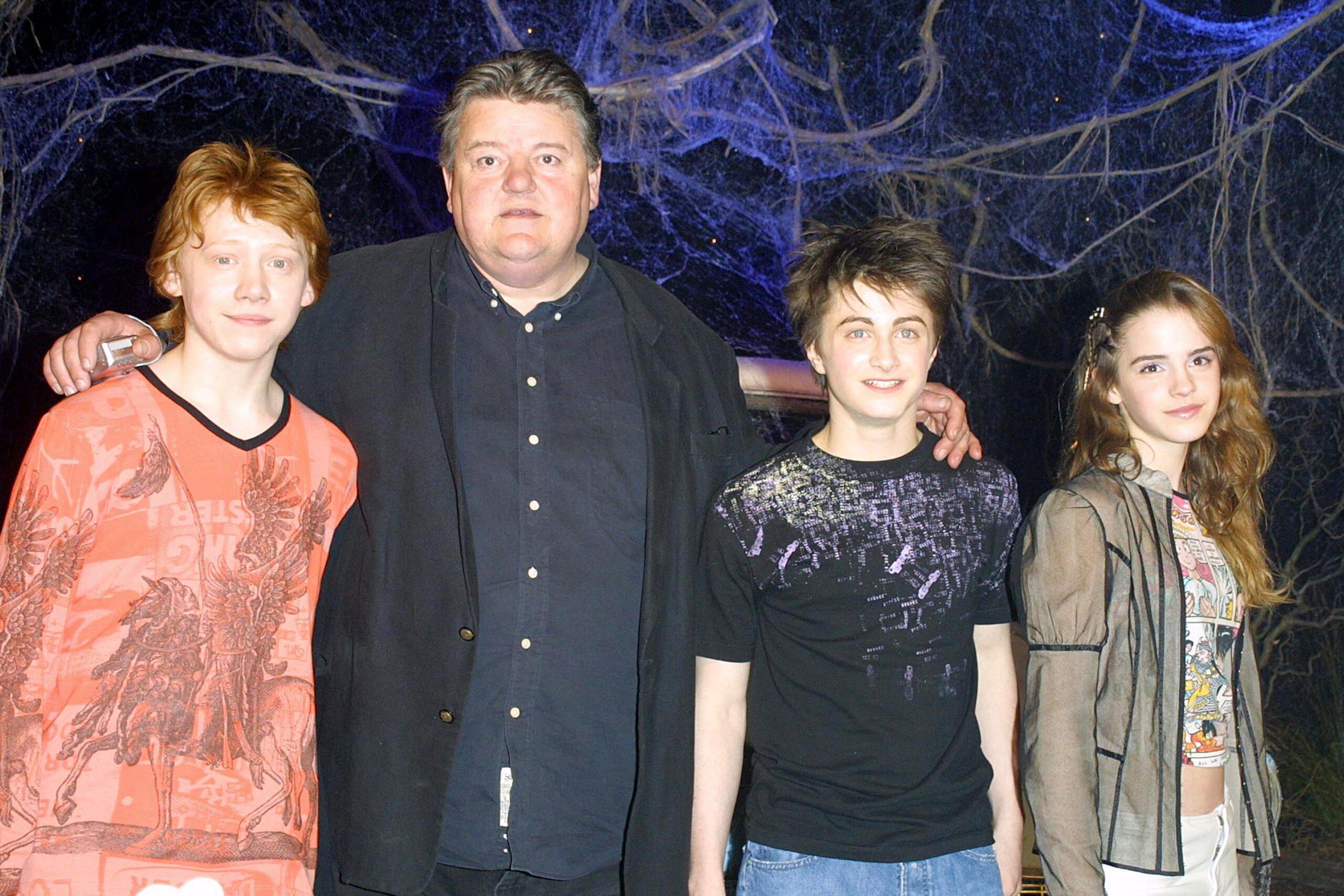 Archive picures taken in 2003. 01 Jan 2003 Pictured: Rupert Grint aka Ron, Robbie Coltrane aka Hagrid, Daniel Radcliffe aka Harry Potter and Emma Watson aka Hermione at the DVD launch of the hit movie Harry Potter and the Chamber of Secrets. The event took place at Leavesden Studios in Hertfordshire, England. Photo credit: MEGA TheMegaAgency.com +1 888 505 6342 (Mega Agency TagID: MEGA163420_011.jpg) [Photo via Mega Agency]
