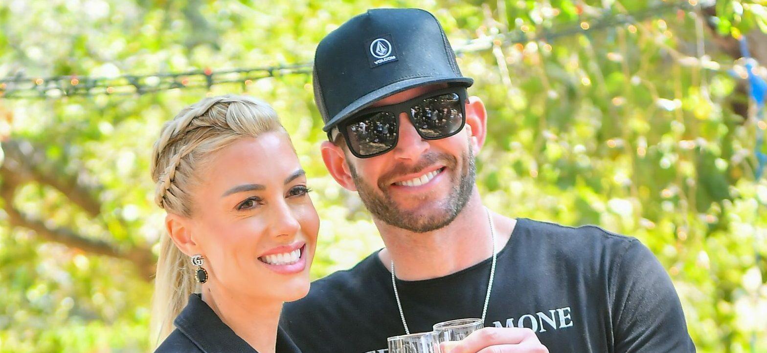 Heather Rae Young and Tarek El Moussa stroll through the Kindred Spirits Care Farm after celebrating her new Peta Campaign