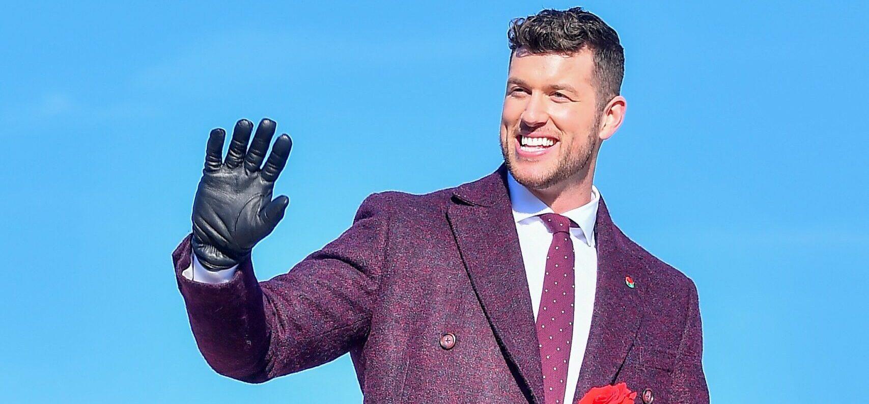Bachelor Clayton Echard is all smiles while on a parade float in the 2022 Rose Parade in Pasadena Ca