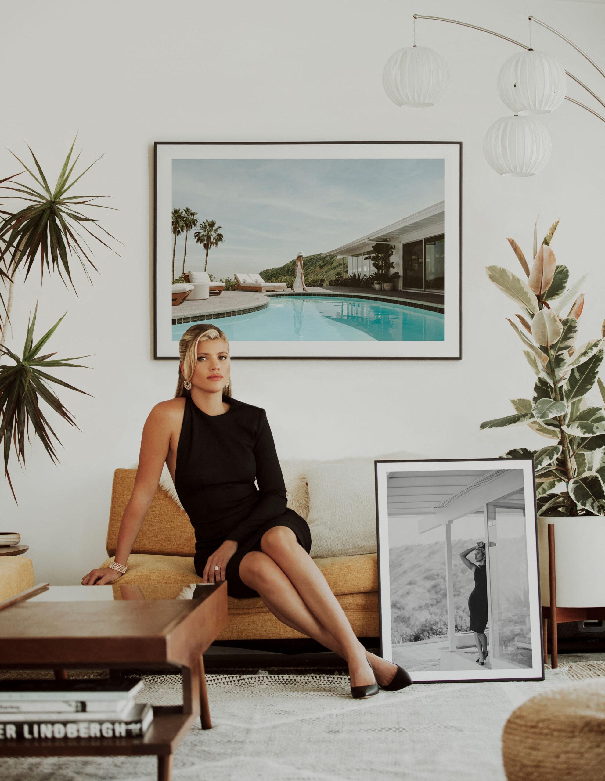 Sofia Richie is bringing a touch of classic Hollywood glamour to homes with a new photo art prints collection. The model stars in the “Studio Hollywood” collection from Desenio, posing by a pool in a white swimsuit in some of the spectacular shots. The collection of 26 photographs is “inspired by the elegance of old Hollywood” and along with Sofia showcases poolside views, mid-century modern architecture, timeless fashion looks and luxury details. It was shot in Los Angeles and Palm Springs and “tells the story of living your dreams with iconic looks and views over Los Angeles,” according to Scandinavian wall art brand Desenio. Sofia said: “I loved the looks we went for during this shoot; I have a huge love for fashion, so it’s always so fun to be able to experiment with clothes and makeup. “Growing up with my mother, who had a fashion line at the time, definitely piqued my interest in fashion. It runs in the family.” She added: “I would say my interior style is traditional and timeless; that’s why I was so excited to do this collection with Desenio. “I love the color palette of beige, brown, and turquoise mixed with the classic black and white photography. It goes really nicely with my home and style.” Studio Hollywood is available to buy from www.desenio.com *BYLINE: Courtesy of Desenio/Mega. 20 Oct 2022 Pictured: Sofia Richie is bringing a touch of classic Hollywood glamour to homes with new Desenio photo art prints collection “Studio Hollywood”. *BYLINE: Courtesy of Desenio/Mega. Photo credit: Courtesy of Desenio/Mega TheMegaAgency.com +1 888 505 6342 (Mega Agency TagID: MEGA909717_002.jpg) [Photo via Mega Agency]