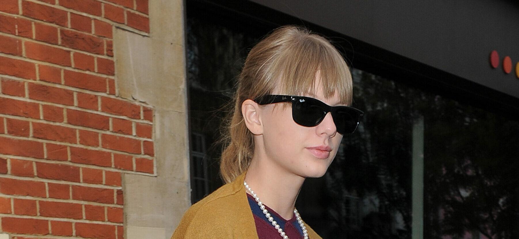 Taylor Swift leaving The Hospital Club in Covent Garden The singer was wearing polkadot jeans a maroon sweater with a yellow cardigan over the top She also wore sunglasses a pearl necklace and a burnt orange Mark Cross Scottie Satchel