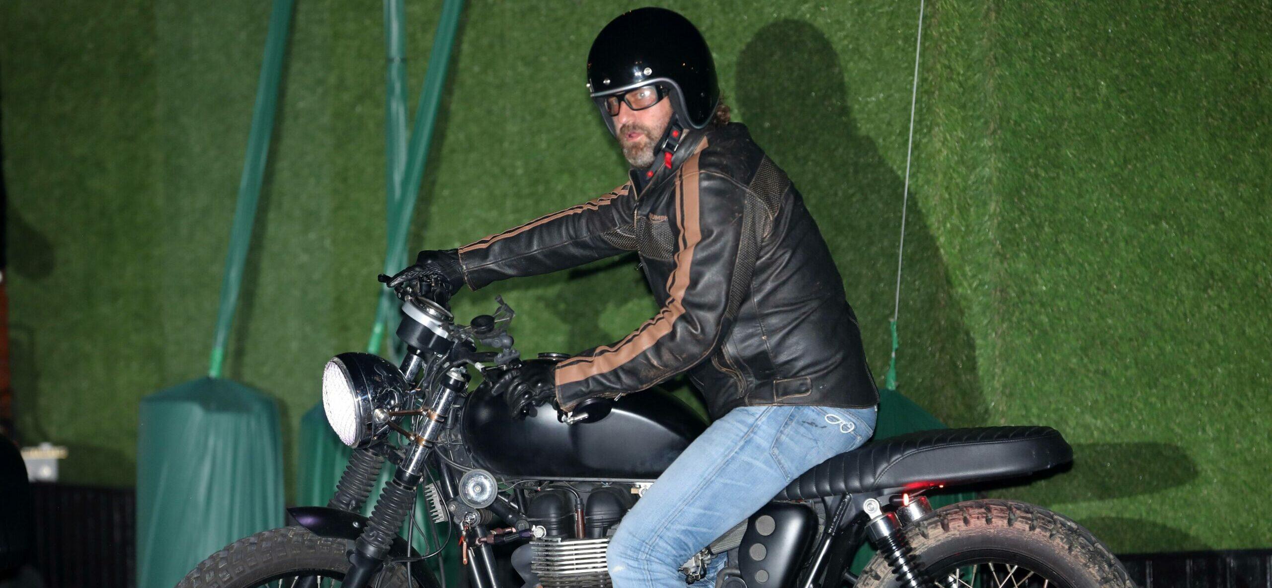 Gerard Butler takes off on his motorcycle after dining at Nobu Malibu with friends
