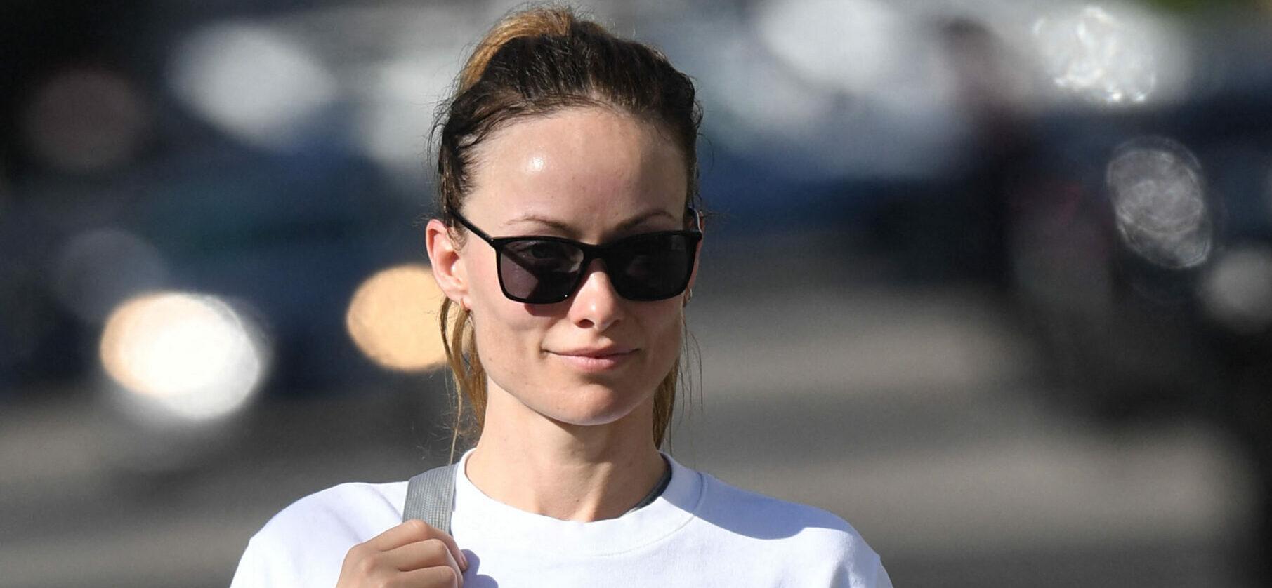 Olivia Wilde leaves the gym smiling after a hard workout
