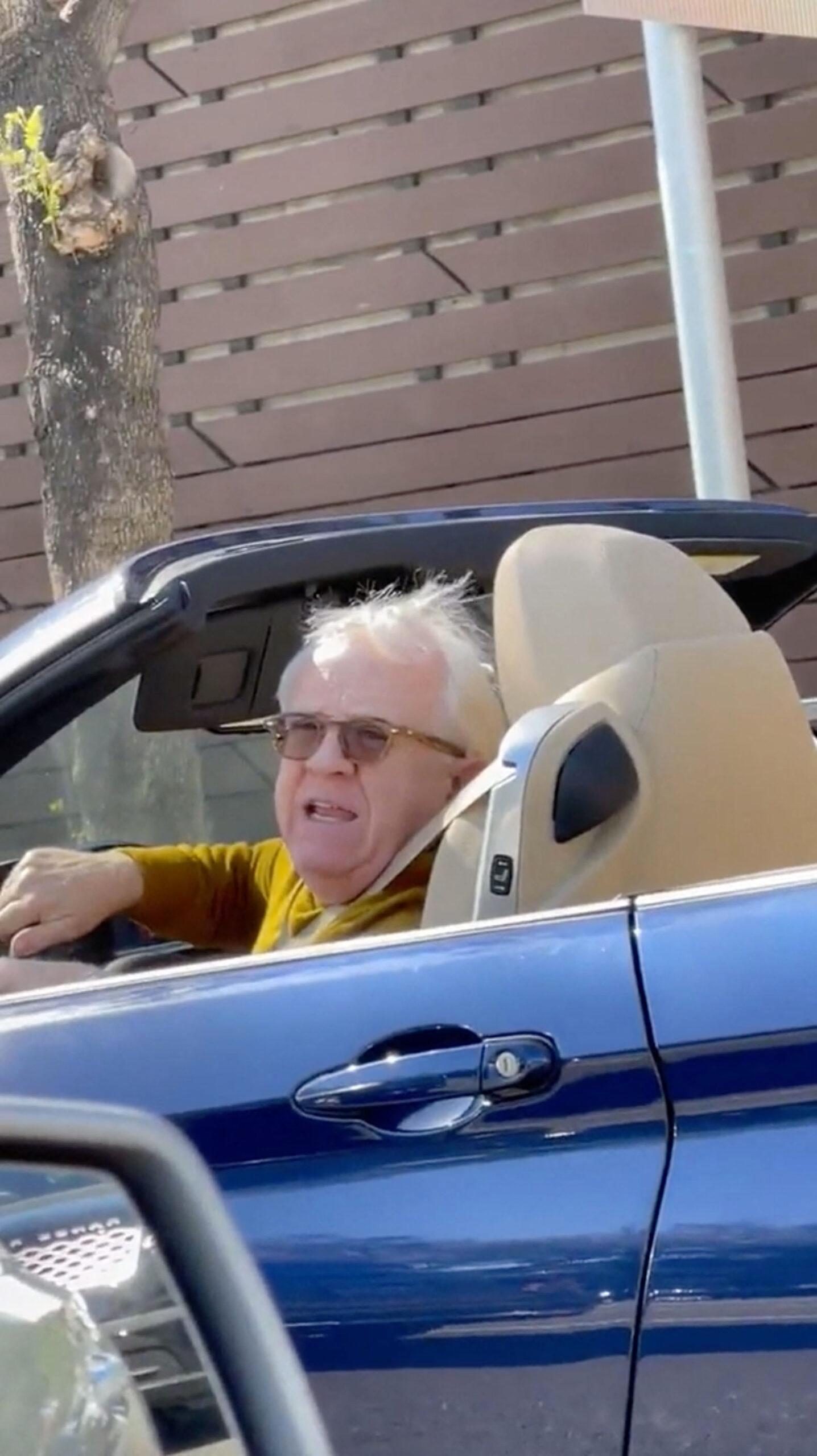 Leslie Jordan seen in April 2022 in his car as he joked with a fan at a red light