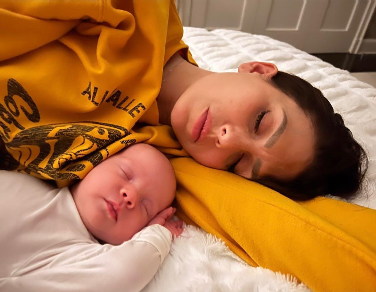 Hilaria Baldwin sleeping with her newborn daughter