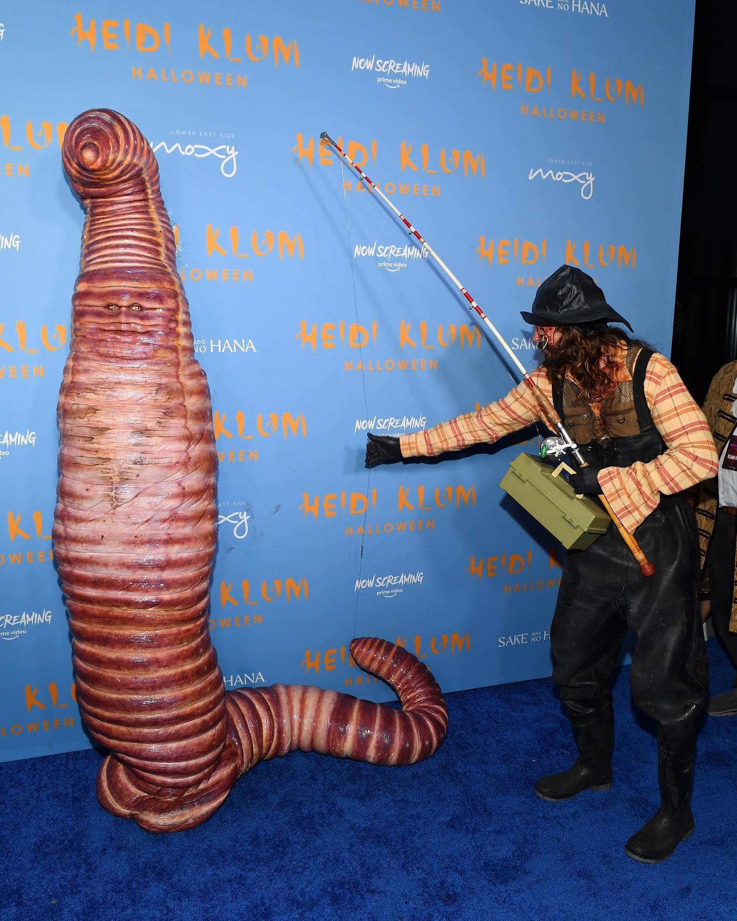 Heidi Klum and Tom Kaulitz pose as a worm and a fisherman for Halloween