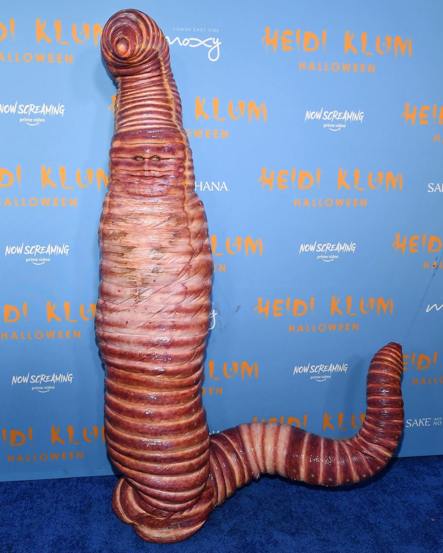 Heidi Klum and Tom Kaulitz pose as a worm and a fisherman for Halloween