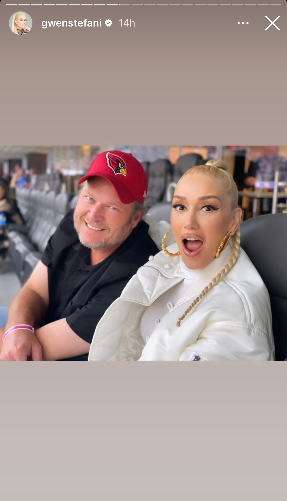 Gwen Stefani and Blake Shelton at a football game