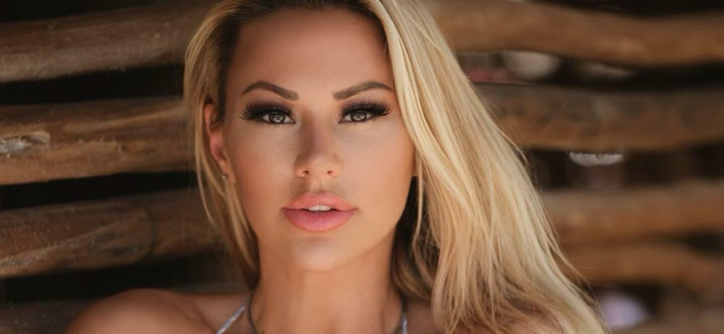 Kindly Myers in a bikini top and daisy dukes featured photo