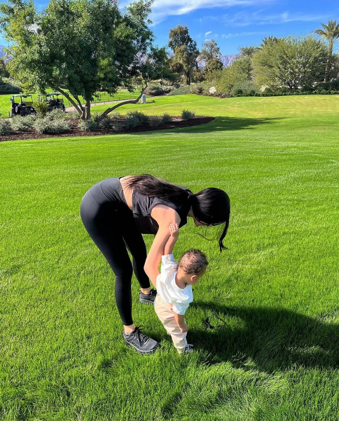Kylie Jenner plays with her son