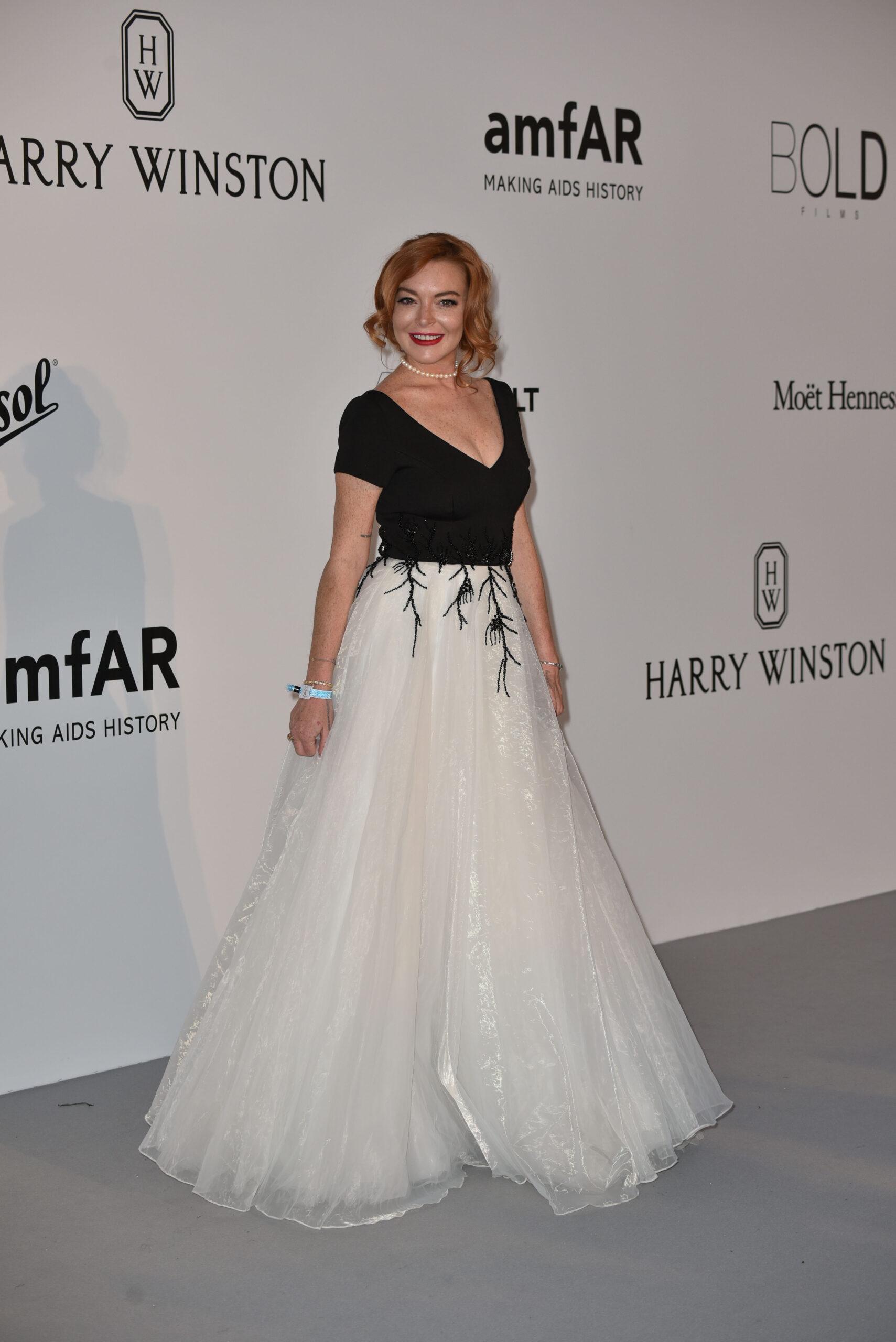 Lindsey Lohan attend the amfAR Gala in Cannes