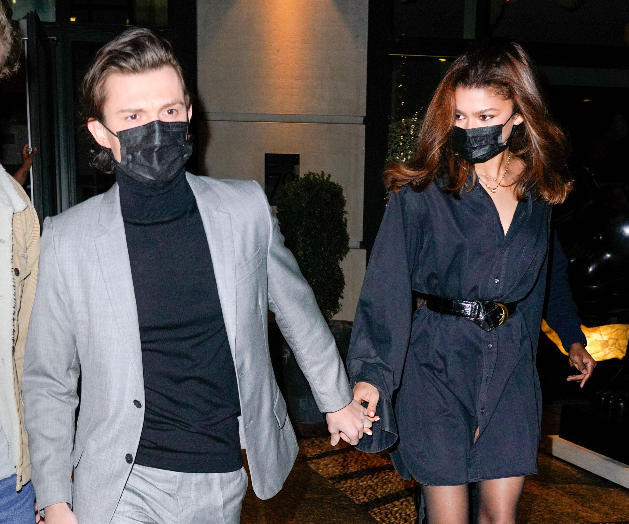 Tom Holland and Zendaya hold hands when exiting their hotel in New York