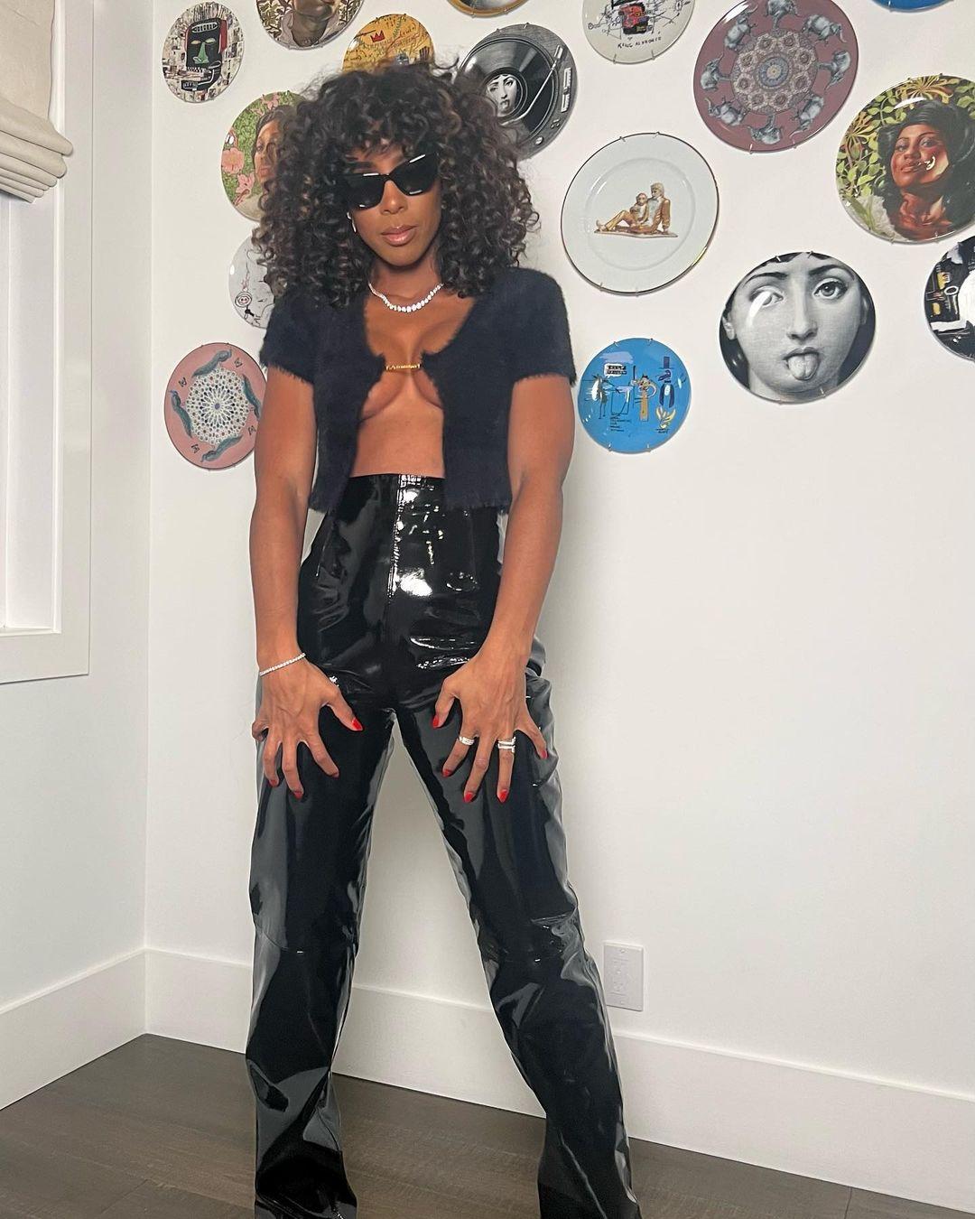 Kelly Rowland Is Popping Out Of Her Shirt In Daring Photos
