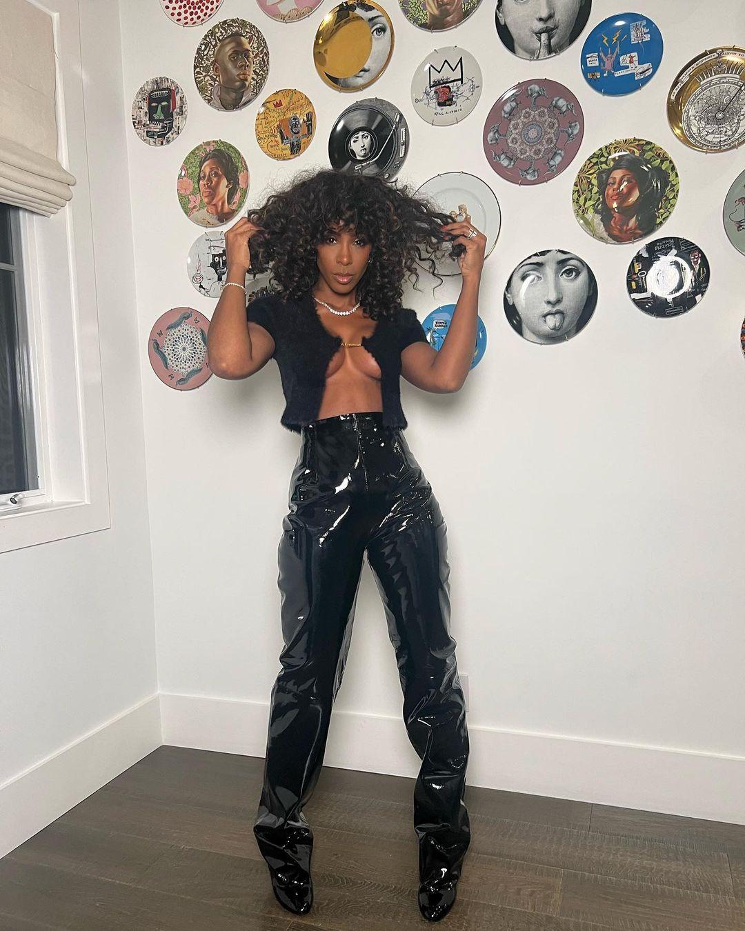 Kelly Rowland Is Popping Out Of Her Shirt In Daring Photos