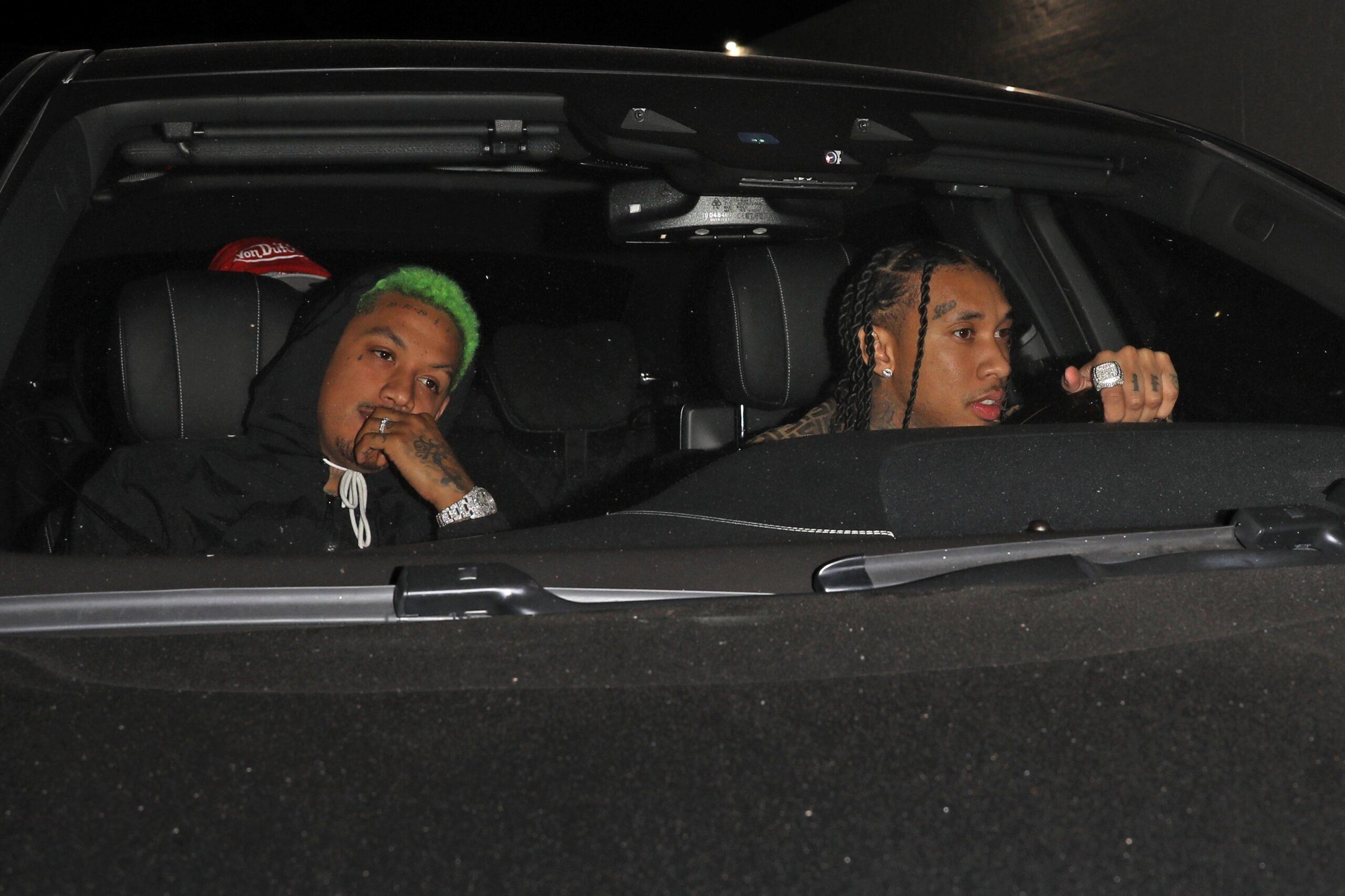 Rapper Tyga and his friend Alexander Edwards are seen leaving the Delilah restaurant
