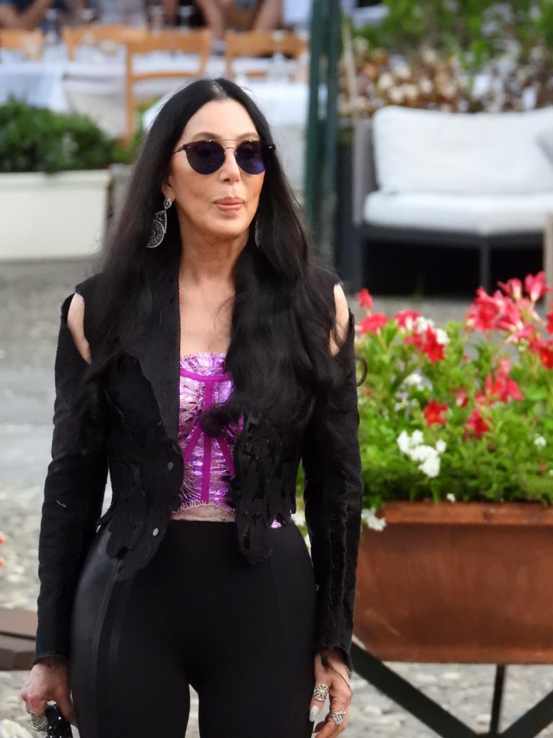 Cher is seen out for a walk with friends in the Italian resort of Portofino